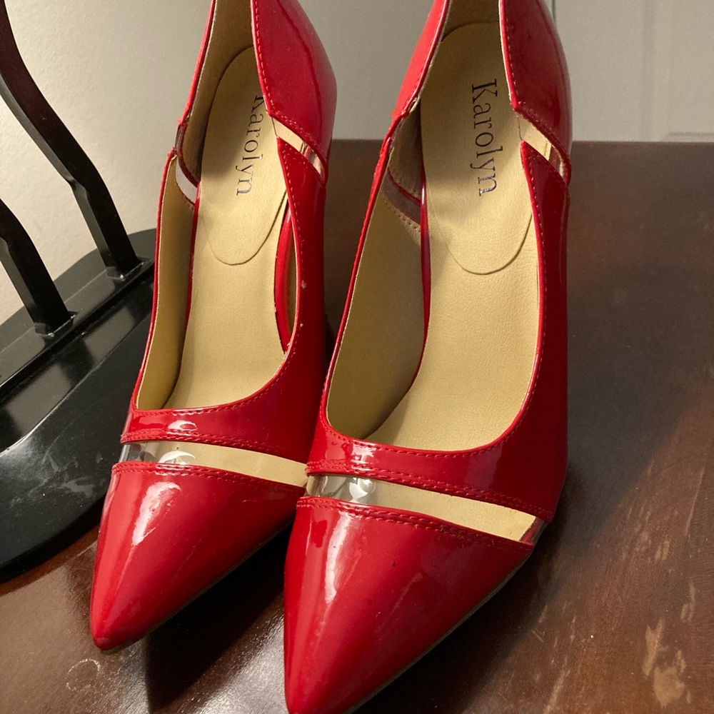 Red heels by Carolyn